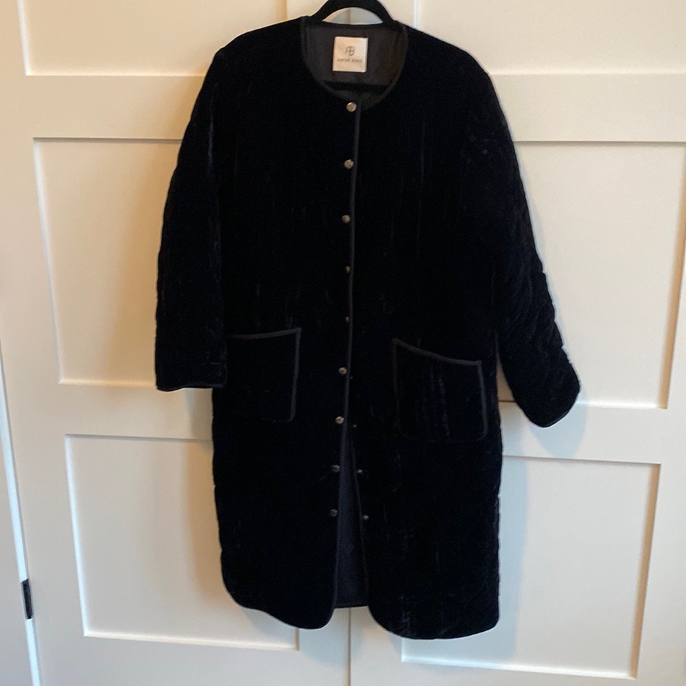 Annie Bing black velvet puff king snap from coat.